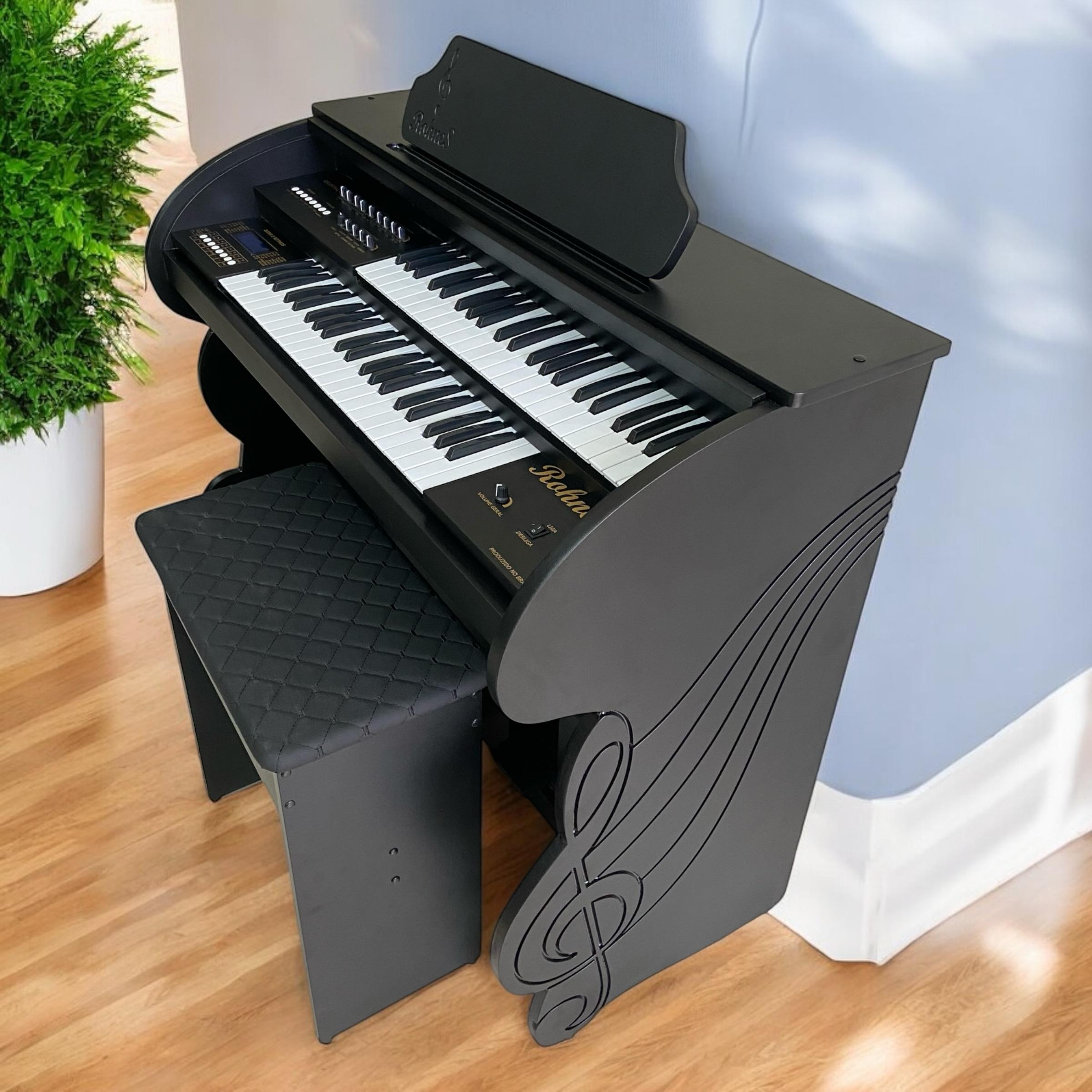Início 19 Órgão Eletrônico Rohnes RS 40: Versatilidade e Performance para Músicos de Todos os Níveis Ideal para igrejas, eventos e estudos musicais, o Órgão Eletrônico Rohnes RS 40 Preto une tecnologia avançada e design robusto em um instrumento completo. Com teclado duplo de 44 notas e pedaleira de 13 notas, ele oferece recursos profissionais para quem busca qualidade sonora e praticidade.
