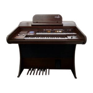 O Órgão Eletrônico Harmonia HS 450 marrom madeirado foi desenvolvido para unir a sonoridade clássica dos órgãos litúrgicos com a praticidade da tecnologia digital. Com dois teclados de 44 notas, pedaleira de 13 pedais e drawbars dedicados, oferece timbres autênticos, ritmos variados e recursos modernos para igrejas, estúdios e apresentações profissionais. Seu gabinete em MDF laminado garante robustez e elegância, acompanhado de banqueta almofadada.
